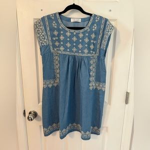 Denim embroidered dress.